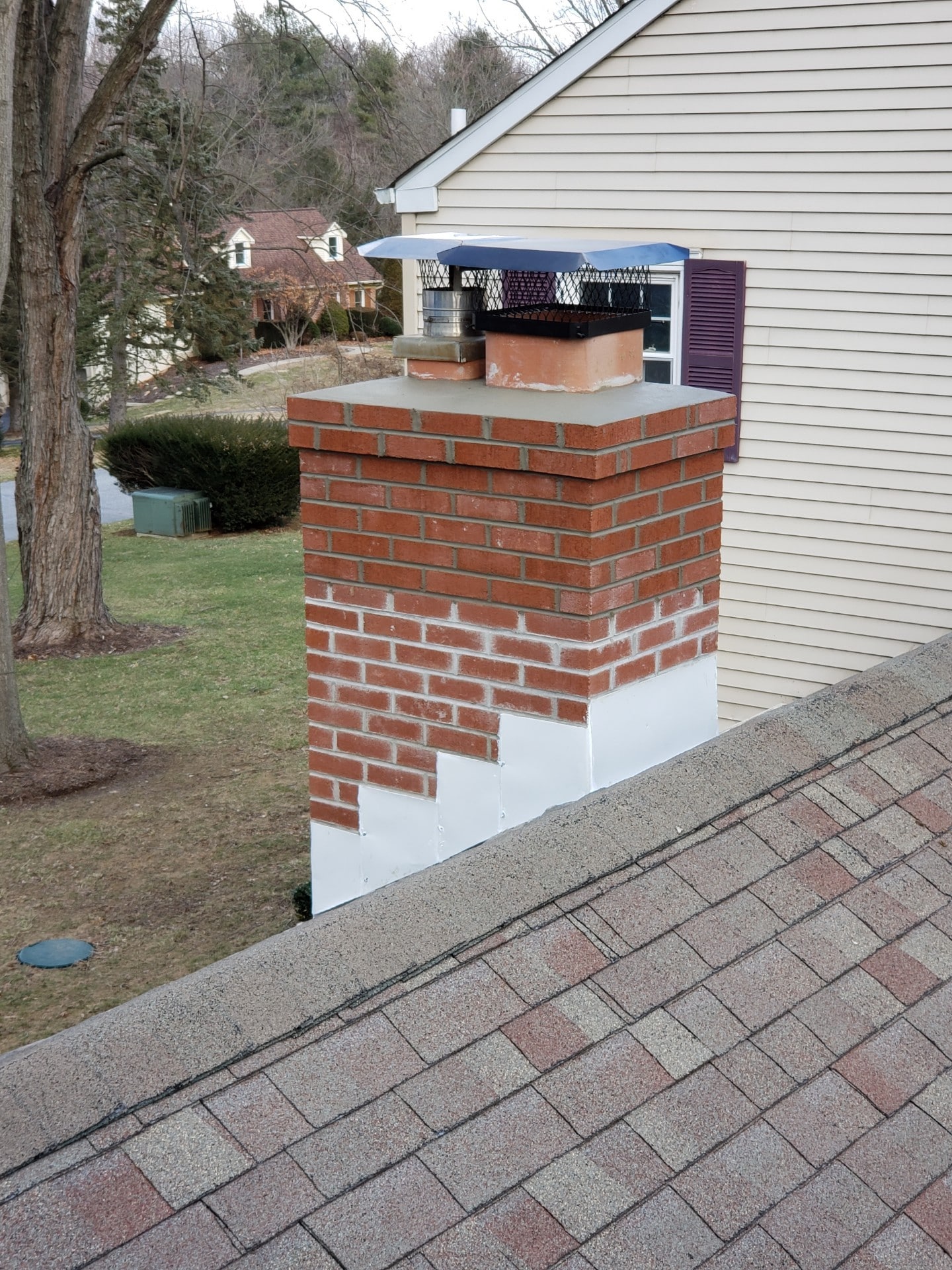 Brick chimney and crown,  Simmers & Sons Masonry, LLC, West Chester, PA.